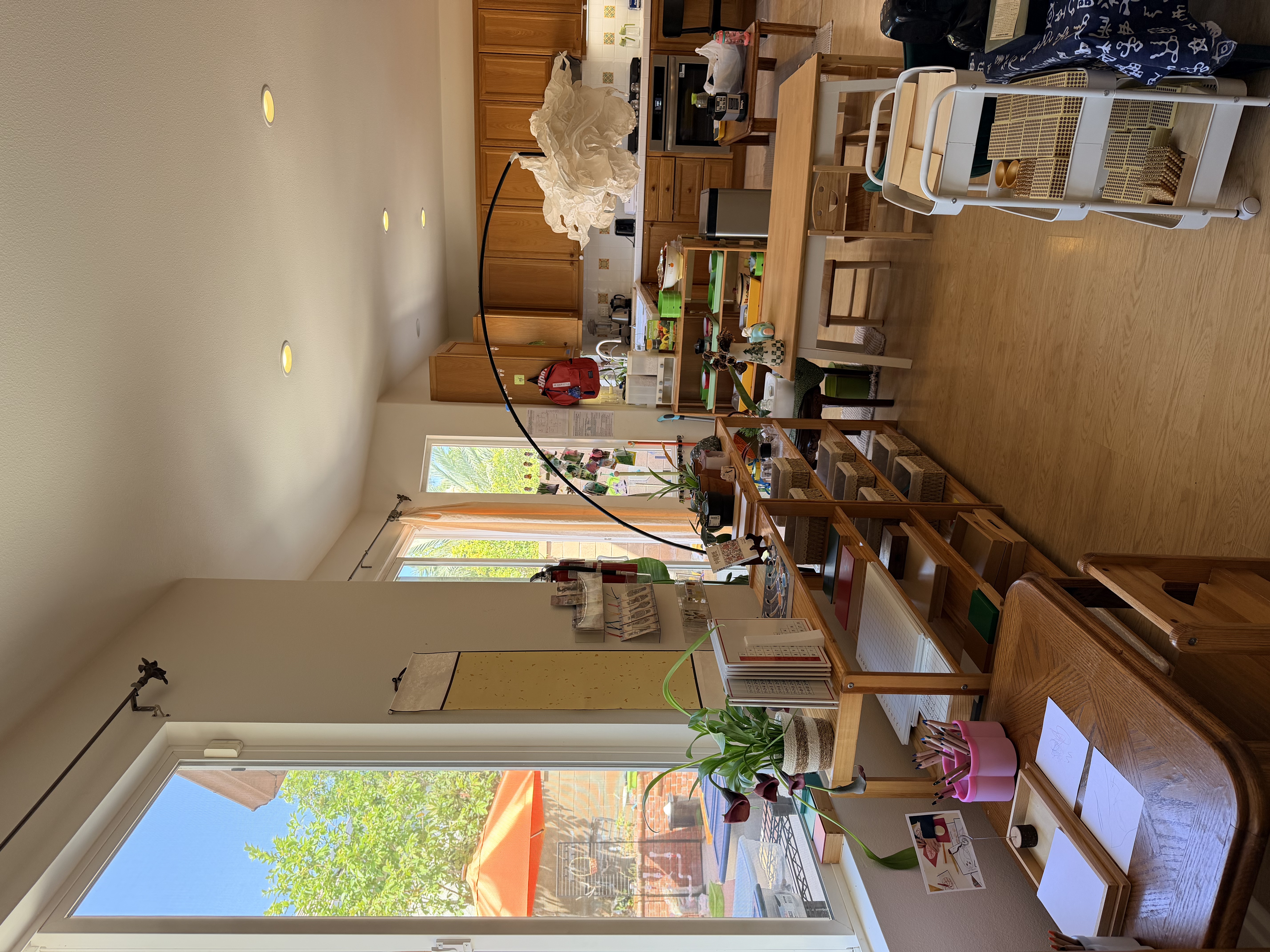 Primary children using Montessori materials in the classroom