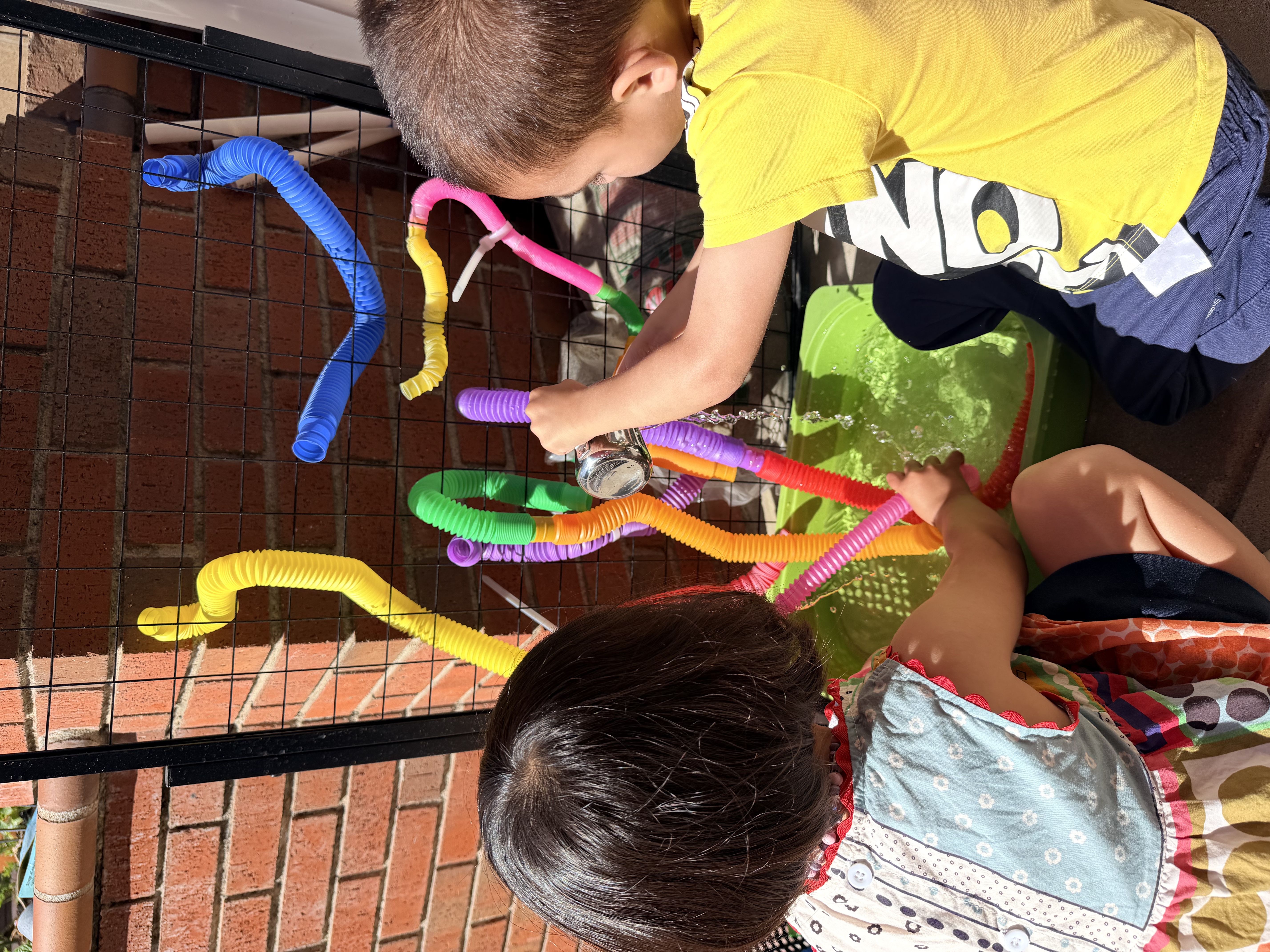 Toddler classroom with movement and open-ended materials